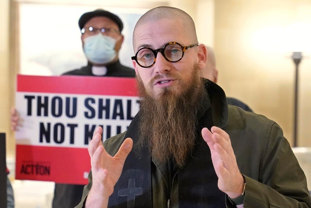 Rev. Jeffrey Hood speaks at a protest against the death penalty 