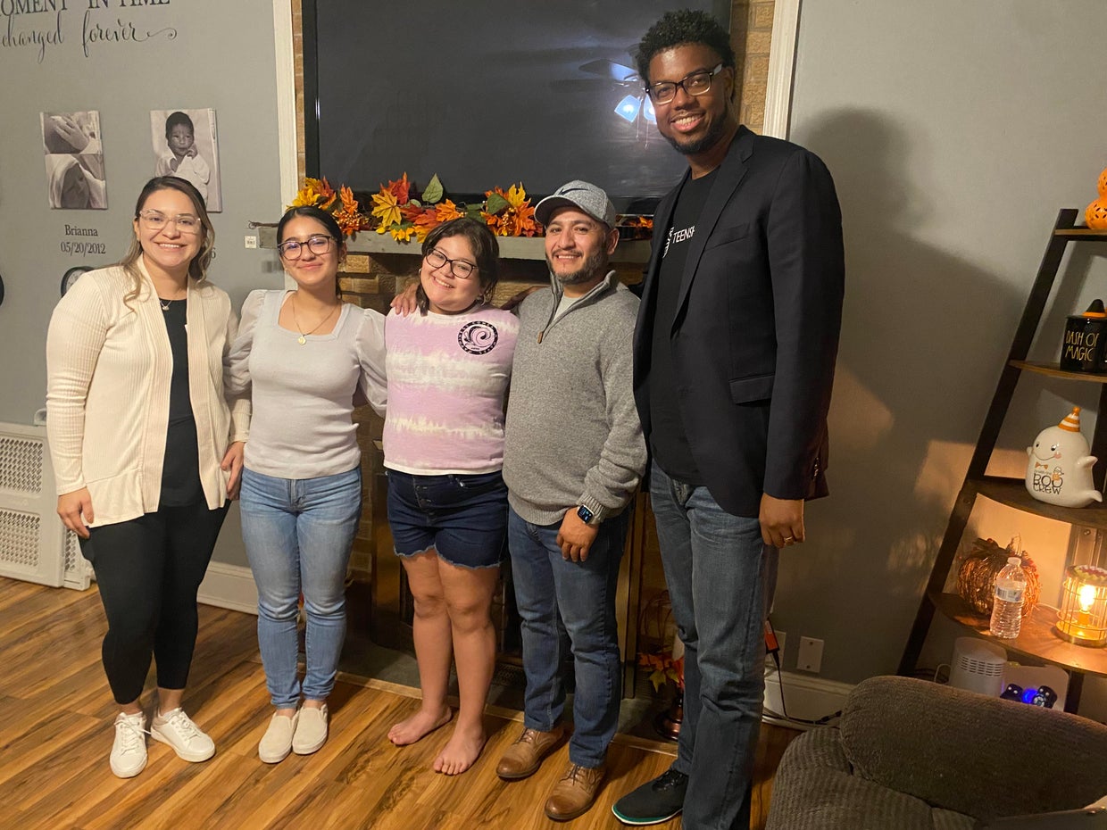 The Rodriguez family with their college adviser 