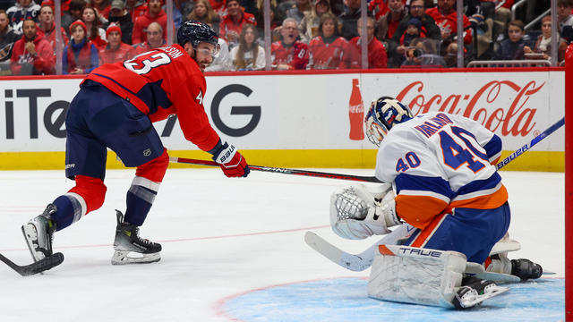 Tom Wilson #43 of the Washington Capitals is stopped on a scoring opportunity by Semyon Varlamov #40 of the New York Islanders during a game at Capital One Arena on December 20, 2023 in Washington, D.C. 