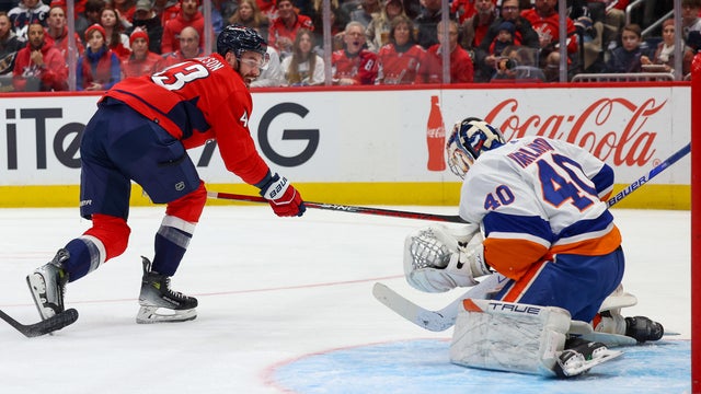 Tom Wilson #43 of the Washington Capitals is stopped on a scoring opportunity by Semyon Varlamov #40 of the New York Islanders during a game at Capital One Arena on December 20, 2023 in Washington, D.C.