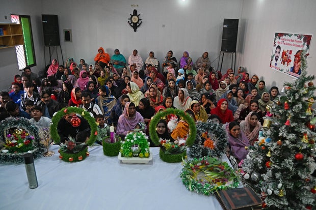 Devotees gather to celebrate Christmas at the rehabilitated Presbyterian Church in Jaranwala, Pakistan, on Dec. 25, 2023, months after homes and churches in the area were attacked over alleged blasphemy
