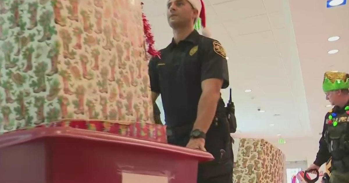 Law enforcement officers unfold holiday getaway cheer for kids at Joe DiMaggio Children’s Hospital