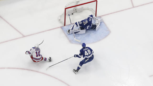 Goalie Andrei Vasilevskiy #88 of the Tampa Bay Lightning gives up a goal against Artemi Panarin #10 of the New York Rangers during the first period at Amalie Arena on December 30, 2023 in Tampa, Florida. 