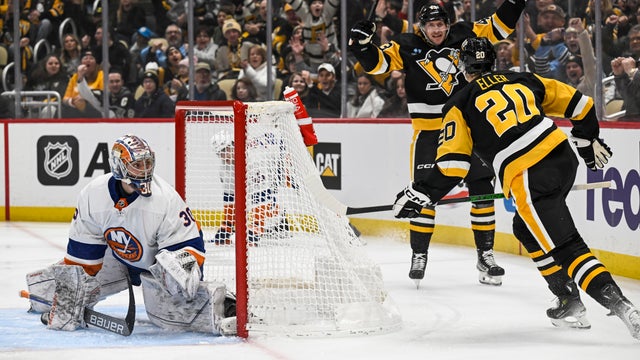 Pittsburgh Penguins center Lars Eller (20) celebrates his goal against New York Islanders goaltender Ilya Sorokin (30) with Pittsburgh Penguins center Jansen Harkins (43) during the first period in the NHL game between the Pittsburgh Penguins and the New