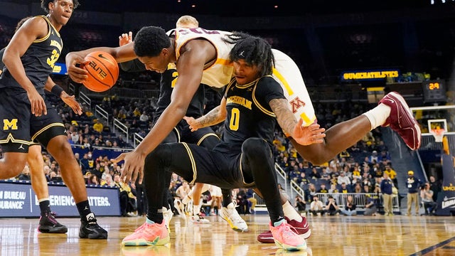 APTOPIX Minnesota Michigan Basketball