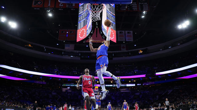 New York Knicks' Jalen Brunson goes up for a shot past Philadelphia 76ers' Tyrese Maxey during the second half of an NBA basketball game, Friday, Jan. 5, 2024, in Philadelphia. 