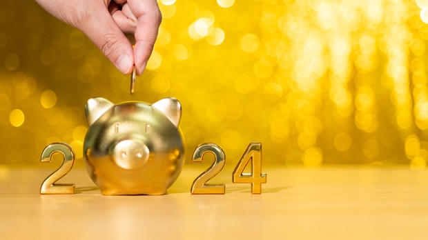 2024 new year and piggy bank on the table 