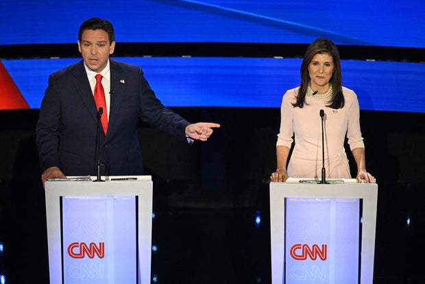 Florida Gov. Ron DeSantis and former U.N. Ambassador Nikki Haley speak during the fifth Republican presidential primary debate at Drake University in Des Moines, Iowa, on Jan. 10, 2024.