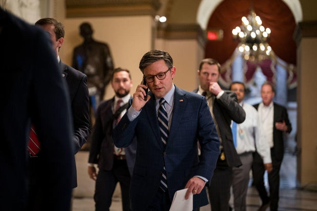 Speaker of the House Mike Johnson departs his office at the U.S. Capitol on Jan. 11, 2024.