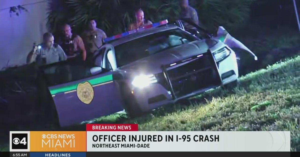 Miami-Dade police officer wounded in I-95 crash Miami-Dade police officer wounded in I-95 crash