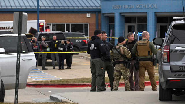 Law Enforcement Officers Investigate A Mass Shooting At Perry High School In Perry Iowa 
