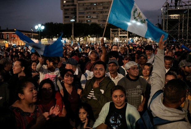 Supporters of President-elect Bernardo Arevalo gather at Constitution Square during his inauguration day, in Guatemala City, Guatemala