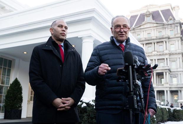 Senate Majority Leader Chuck Schumer and House Democratic Leader Hakeem Jeffries speak to reporters following a meeting with President Biden at the White House on Jan. 17, 2024. 