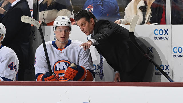 New York Islanders Head Coach Lane Lambert talks with Julien Gauthier #16 during the first period of the game against the Arizona Coyotes at Mullett Arena on January 04, 2024 in Tempe, Arizona. 