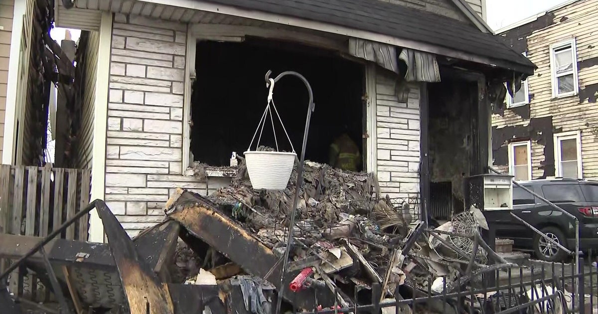 Over a dozen displaced as fire spreads to 2 homes in Jersey City - CBS ...
