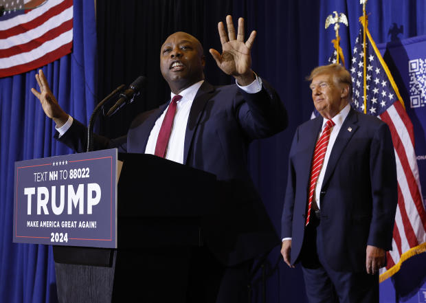 Sen. Tim Scott speaks on stage at a Trump campaign event in New Hampshire 
