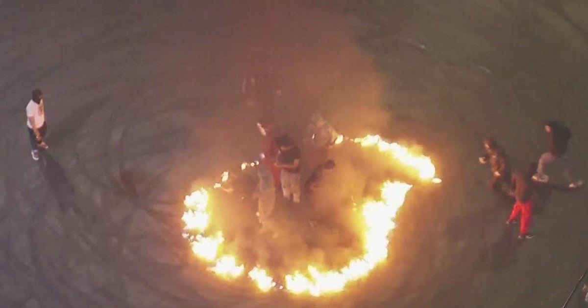 Oakland sideshow participants jump into ring of fire lit in ...