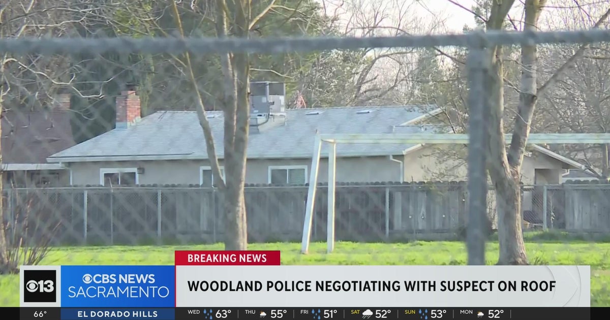 Negotiations continue with suspect on roof after Woodland chase