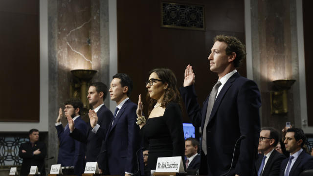 From left, Jason Citron, CEO of Discord; Evan Spiegel, CEO of Snap; Shou Zi Chew, CEO of TikTok; Linda Yaccarino, CEO of X; and Mark Zuckerberg, CEO of Meta, are sworn in as they testify before the Senate Judiciary Committee on Jan. 31, 2024, in Washingto 