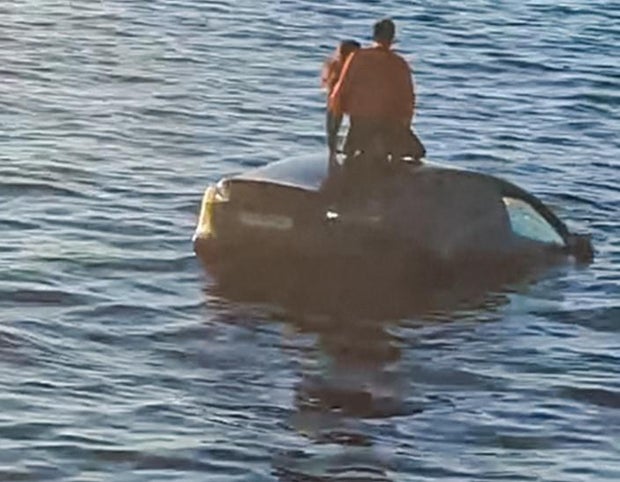 A Tesla plunged into frigid water in Norway. The motorists were rescued by a floating sauna as their car sank.