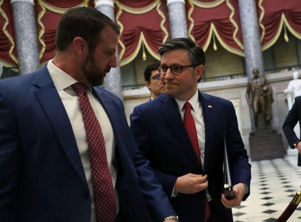 Speaker of the House Mike Johnson makes his way to the House chamber in the U.S. Capitol on Jan. 31, 2024.