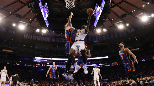 LeBron James #23 of the Los Angeles Lakers shoots against Isaiah Hartenstein #55 of the New York Knicks during their game at Madison Square Garden on February 03, 2024 in New York City. 