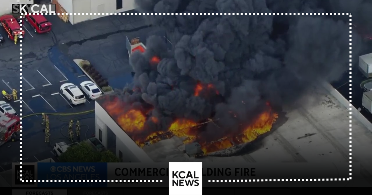 Massive fire breaks out at Carson commercial building - CBS Los Angeles