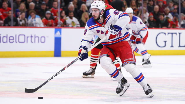 Mika Zibanejad #93 of the New York Rangers brings the puck up ice during the first period against the Chicago Blackhawks at the United Center on February 9, 2024 in Chicago, Illinois. 