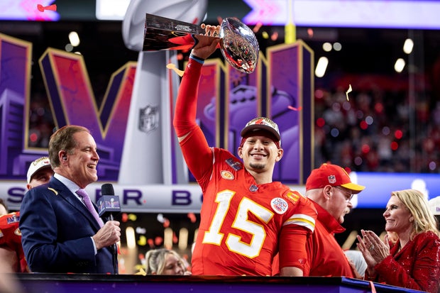 Patrick Mahome with trophy after winning Super Bowl LVIII