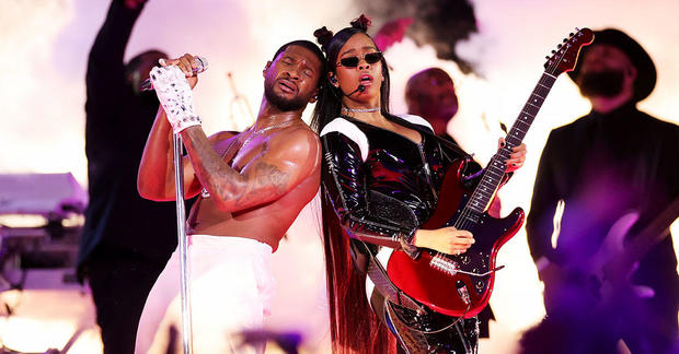 Usher and H.E.R. perform in the Apple Music Super Bowl LVIII Halftime Show 