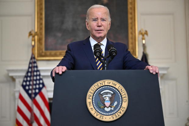 President Biden speaks in the State Dining Room of the White House on Feb. 6, 2024. 