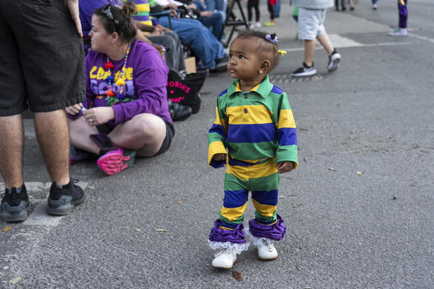 Paradegoers are seen during the Oshun Mardi Gras parade in Uptown New Orleans 