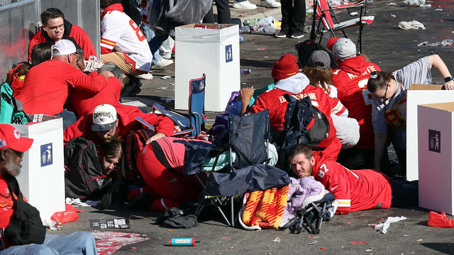 People take cover during a shooting at Union Station during the Kansas City Chiefs' Super Bowl victory parade Feb. 14, 2024, in Kansas City, Missouri. 
