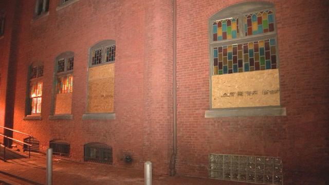 Windows boarded up at Mother Bethel Church in Philadelphia after vandalism 