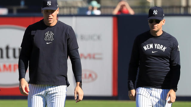 New York Yankees Outfielder Aaron Judge (99) and Manager Aaron Boone walk together during the spring training workout on February 20, 2024 at George M. Steinbrenner Field in Tampa, FL. 