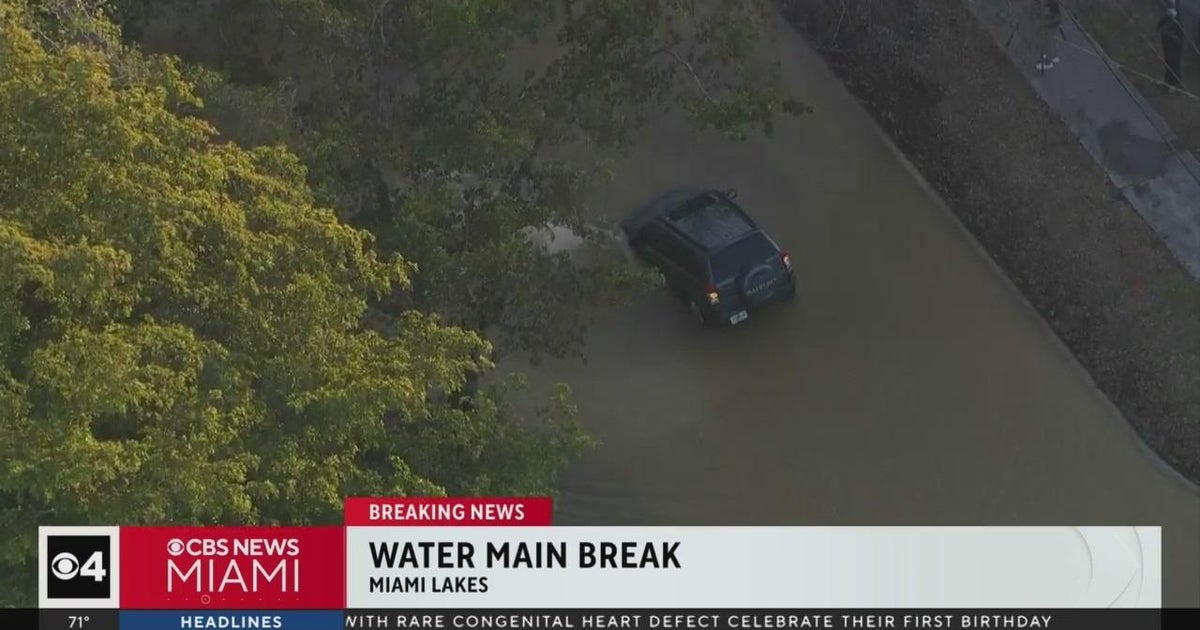 Drinking water principal break floods Miami Lakes street Drinking water principal break floods Miami Lakes street