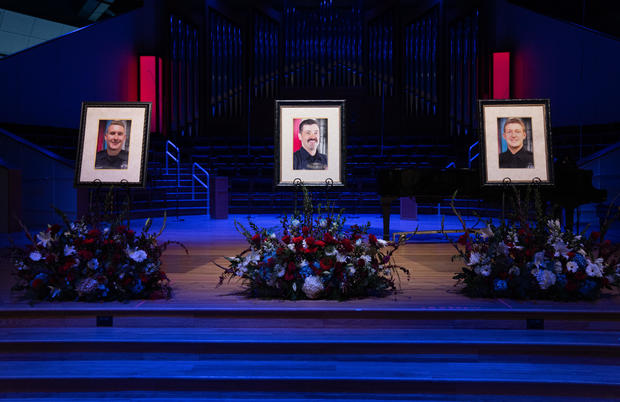 Burnsville, Minn. slain police officers and paramedic memorial service funeral 