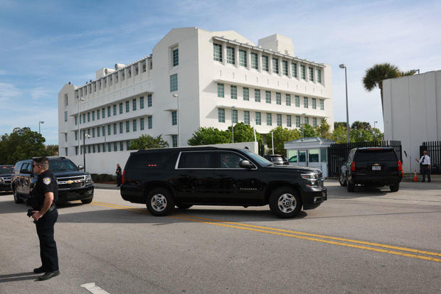 A vehicle carrying former President Donald Trump is driven to the Alto Lee Adams Sr. U.S. Courthouse on March 1, 2024, in Fort Pierce, Florida. 