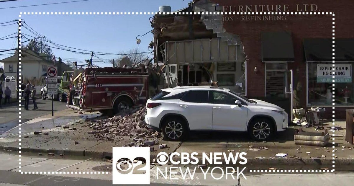 Video shows fire truck crashing into building on Long Island - CBS New York