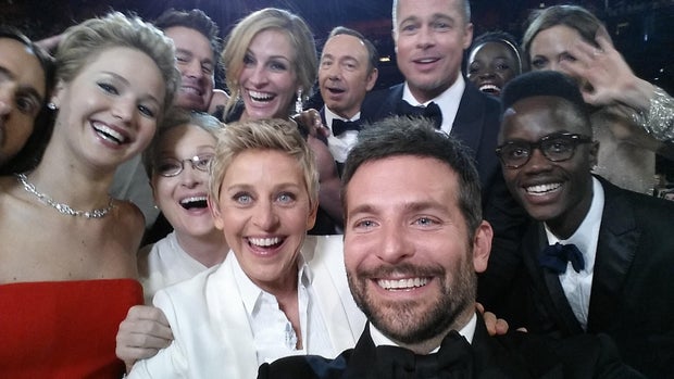 Clockwise from left, Jared Leto, Jennifer Lawrence, Meryl Streep, Channing Tatum, Julia Roberts, Kevin Spacey, Brad Pitt, Lupita Nyong'o, Angelina Jolie, Peter Nyong'o Jr., Bradley Cooper and Ellen DeGeneres pose for a selfie taken by Cooper during the Ac