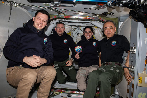 From left, the Crew 7 astronauts pose for a group photo aboard the International Space Station: cosmonaut Konstantin Borisov, European Space Agency astronaut Andreas Mogensen, commander Jasmin Moghbeli and Japanese astronaut Satoshi Furukawa. 