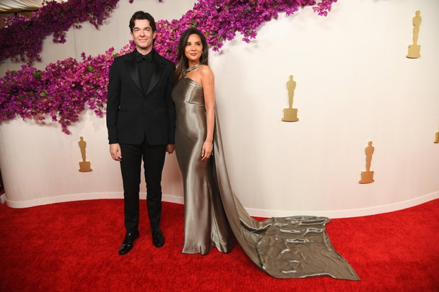 John Mulaney and Olivia Munn at the 96th Academy Awards