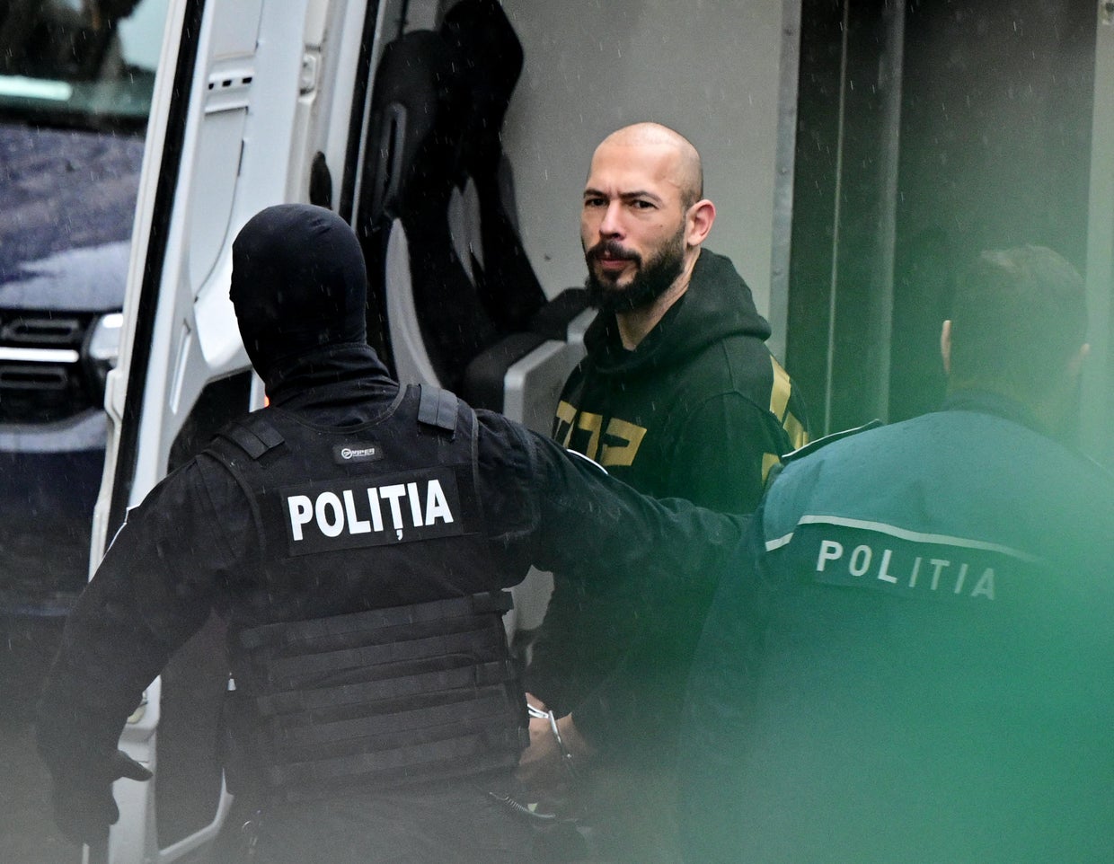 TOPSHOT-ROMANIA-BRITAIN-US-COURT-CRIME 
