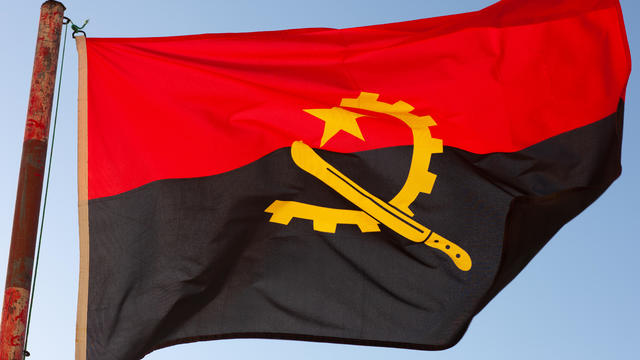 Angolan flag in the wind, Namibe Province, Tombua, Angola 
