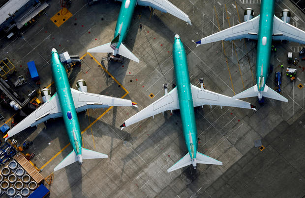 An aerial photo shows Boeing 737 Max airplanes parked on the tarmac at the Boeing Factory in Renton, Washington, March 21, 2019. 