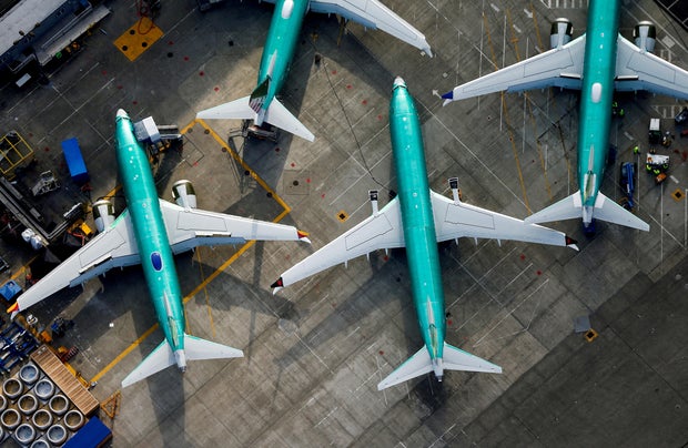 An aerial photo shows Boeing 737 Max airplanes parked on the tarmac at the Boeing Factory in Renton, Washington, March 21, 2019.