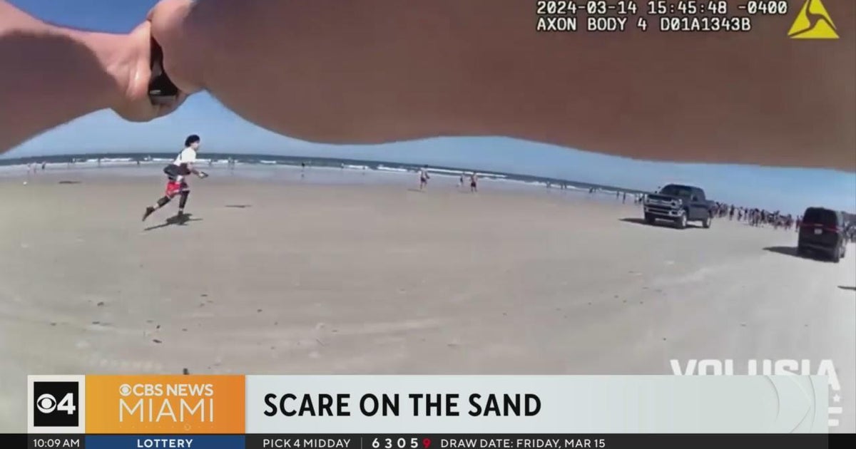 Scare on the sand after teen pulls out gun on spring breakers in New Smyrna Beach - CBS Miami