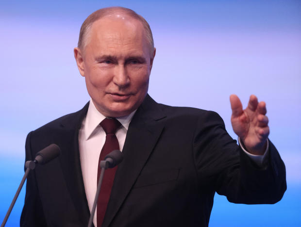 Russia's Vladimir Putin hails election victory, but critics make presence known despite harsh suppression