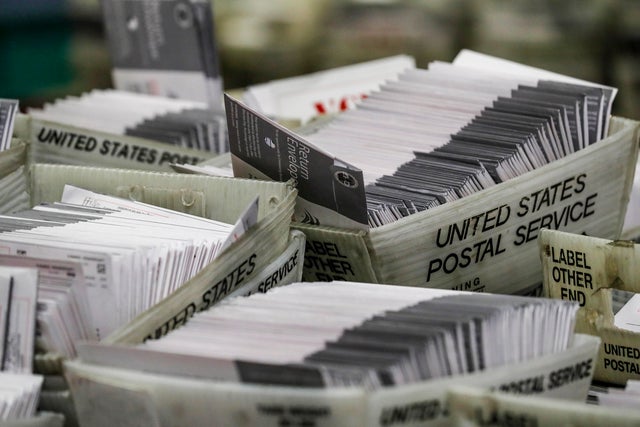 Ballots are received, sorted and verified at the LA County ballot processing facility. 