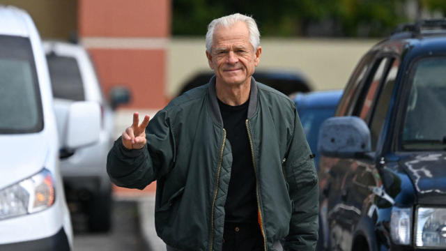 Peter Navarro arrives to speak to the press at the Country Mall Plaza before reporting to federal prison in Miami on March 19, 2024. 